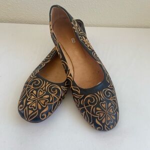 Handmade tooled leather flats